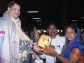 Sathguru presenting Memento to Mr & Mrs.Jyothula Nageeswara (Yoga Teacher)