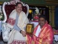 Sathguru presenting Memento to Mr. Banala Durga Prasad Sidhanthi