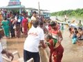 Volunteer providing assistance to elderly at Subbayamma ghat , Rajahmundry on 20th Jul 2015, 7th day of Godavari Pushkaralu