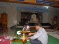 Volunteers making decoration Veena item ( stringed instrument) on 24 Jul 2015 at Rajahmundry Ashram, 12th day of Godavari Pushkaralu