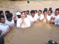 Sathguru Dr.Umar Alisha praying the SUN ( Suryanamaskar) at Saraswathi ghat, Rajahmundry on 12th day of Godavari Pushkaralu